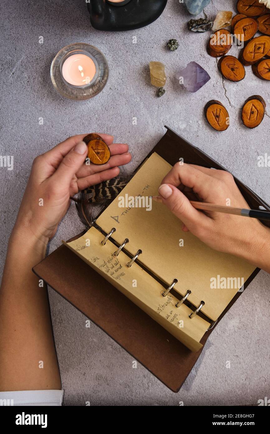 working with runes recording values Stock Photo - Alamy