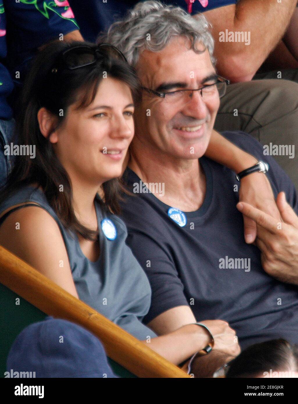 France S Soccer Coach Raymond Domenech R And His Friend Estelle Denis Watch The Men S Final Match Between Switzerland S Roger Federer And Spain S Rafael Nadal At The French Open Tennis Tournament At Roland