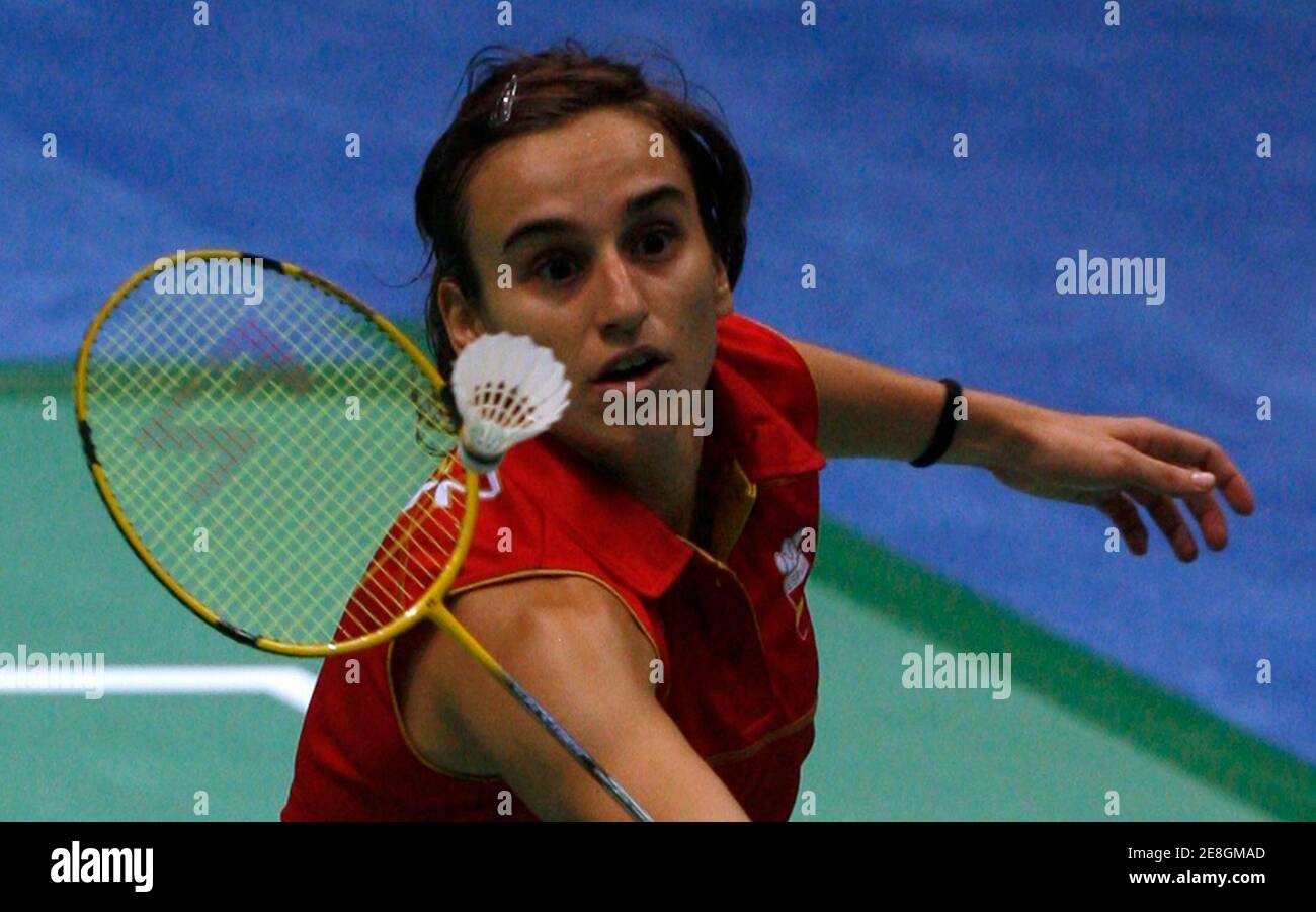 Yoana Martinez of Spain plays a shot to Erin Carroll of Australia during her women's singles first round badminton match at the Beijing 2008 Olympic Games August 9, 2008.  REUTERS/Beawiharta (CHINA) Stock Photo