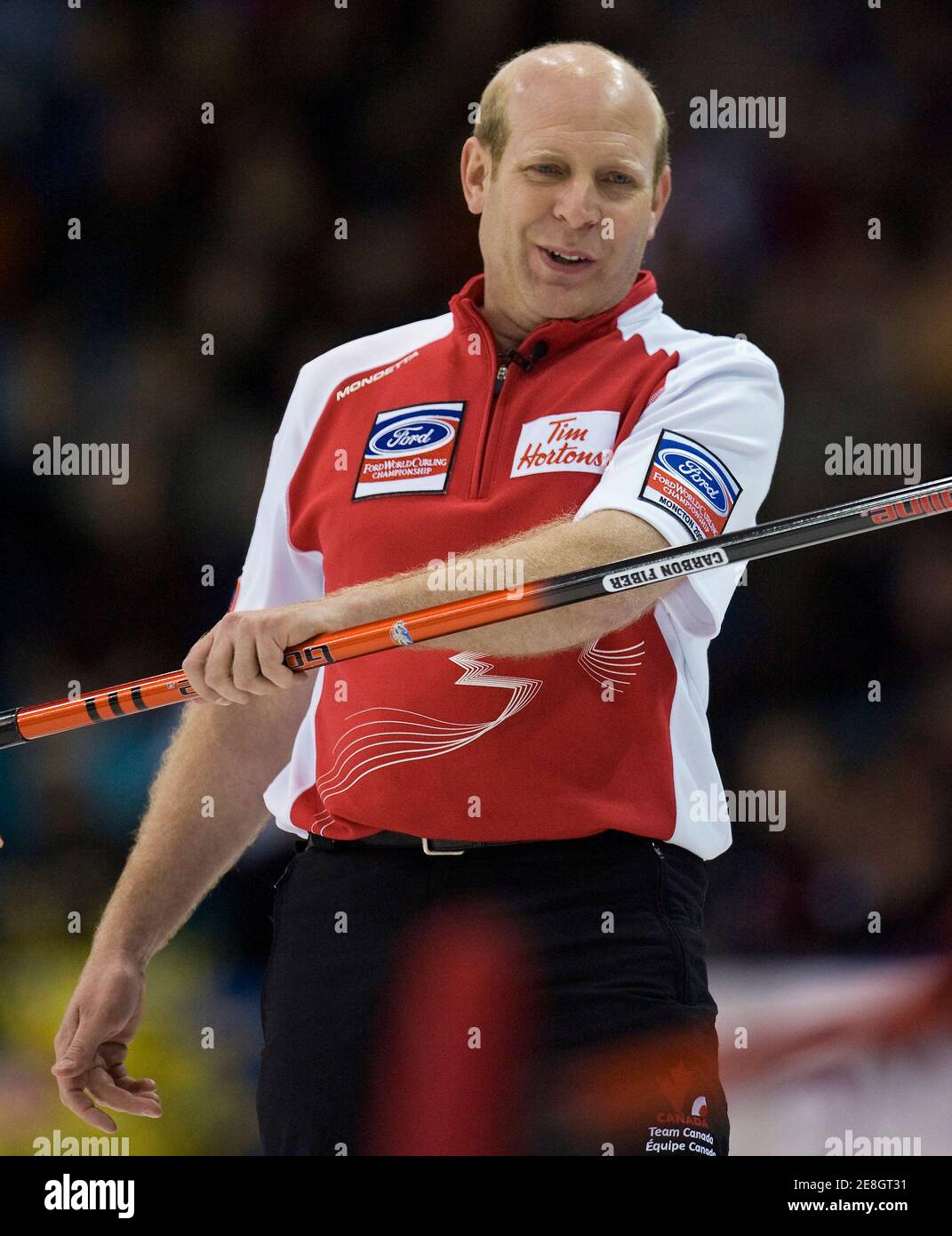 Canada's skip Kevin Martin reacts to one of his shots during their game against Norway at the World Men's Curling Championships in Moncton, New Brunswick April 7, 2009. Canada is currently undefeated in the championship with a record of 7-0.         REUTERS/Andy Clark     (CANADA SPORT CURLING) Stock Photo