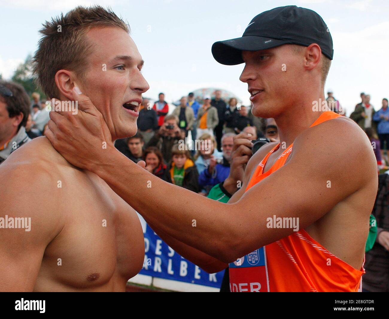 Trey Hardee of the United States (R) congratulates Germany's Michael Schrader for his victory at the two-day international decathlon meeting in Goetzis, May 31, 2009.  REUTERS/Miro Kuzmanovic (AUSTRIA SPORT ATHLETICS) Stock Photo