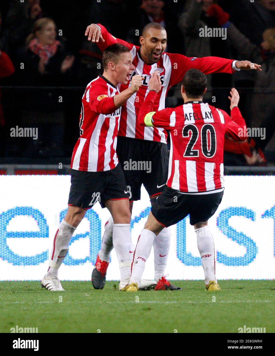 PSV Eindhoven's Orlando Engelaar (C) celebrates with team mates after scoring during their Europa League soccer match against AC Sparta Prague at the Phillips stadium in Eindhoven December 3, 2009.    REUTERS/Jerry Lampen (NETHERLANDS SPORT SOCCER) Stock Photo