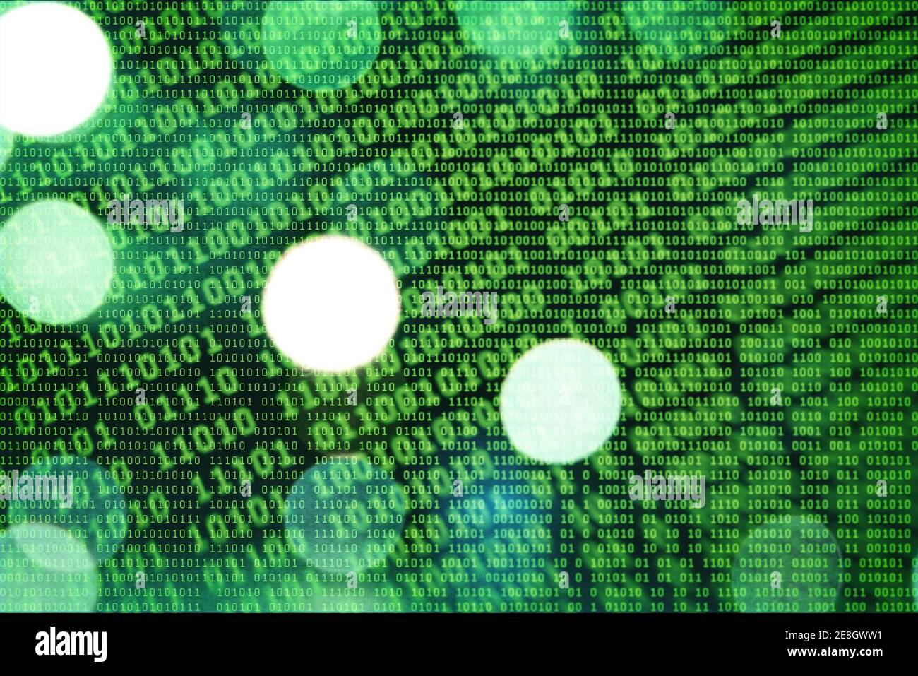 An illustration of green binary code on bokeh background Stock Photo