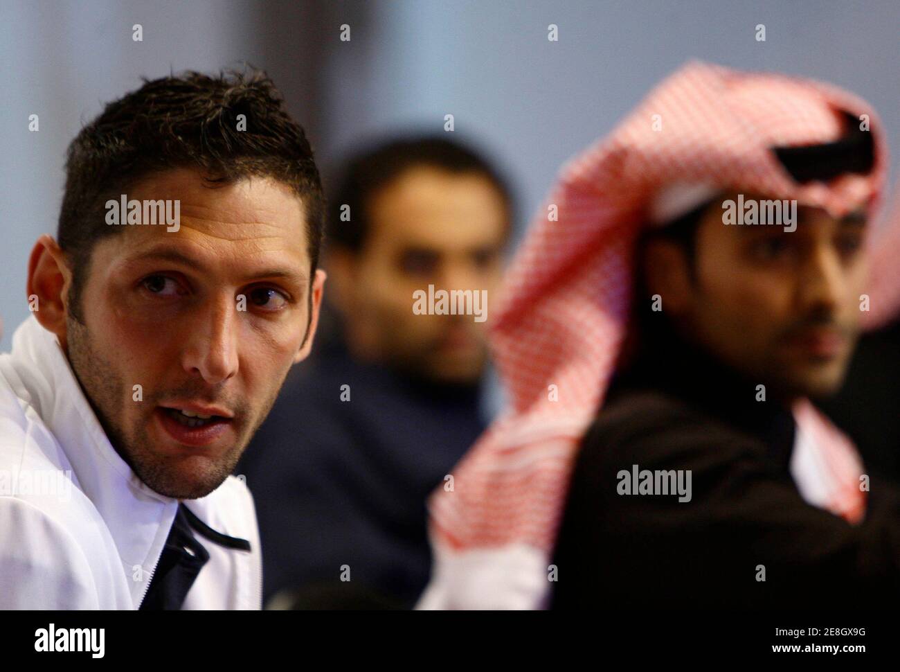 Inter Milan's Marco Materazzi (L) attends a news conference after their match with Al Hilal at King Fahd International Stadium in Riyadh January 2, 2010. Inter Milan are in Riyadh to play against Saudi club Al Hilal in a testimonial match in honour of veteran Saudi soccer player Nawaf Al-Temyat.  REUTERS/Fahad Shadeed      (SAUDI ARABIA - Tags: SPORT SOCCER) Stock Photo