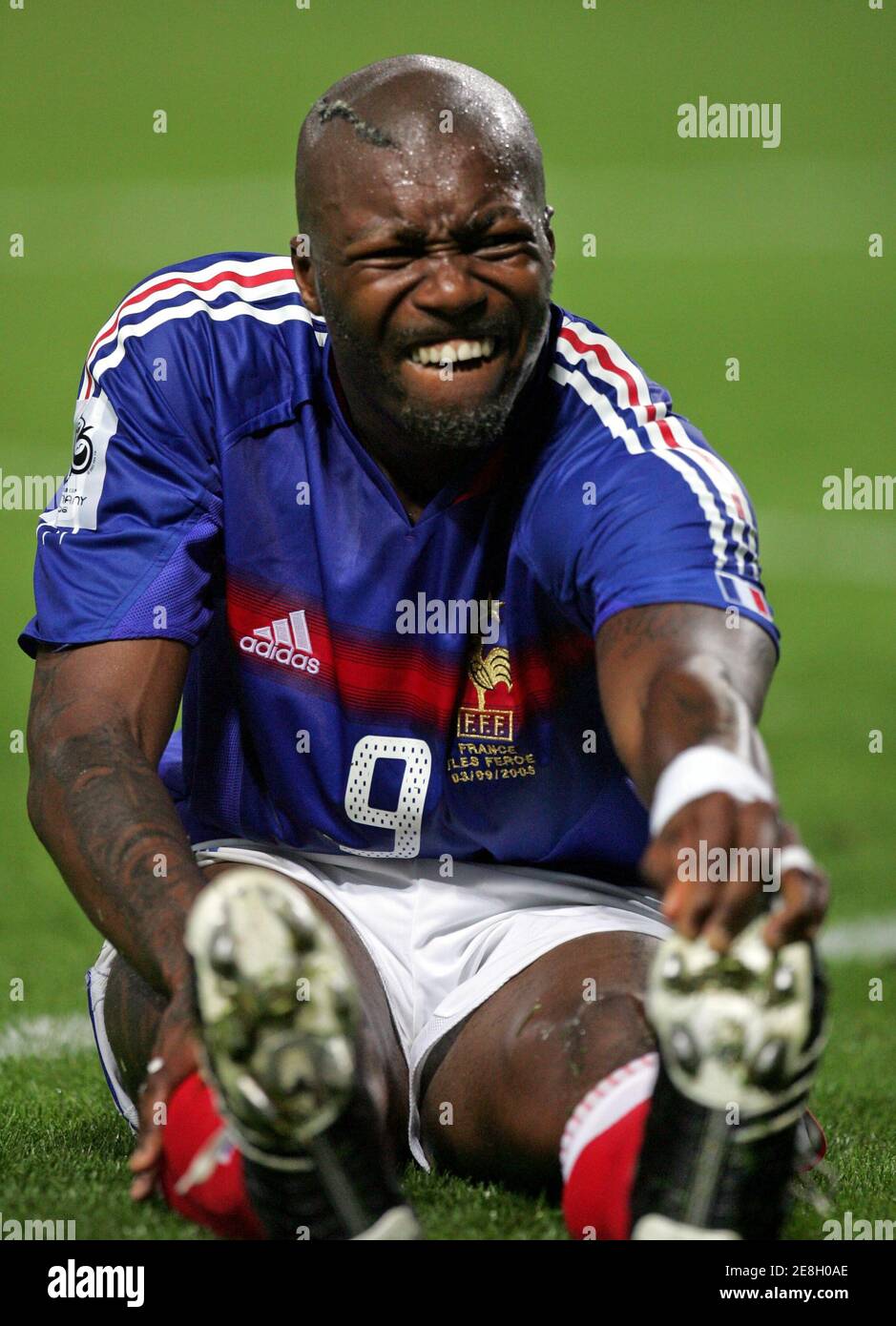 Djibril Cisse of France grimaces during the World Cup 2006 Group Four  qualifying soccer match against the [Faroe Islands] at Bollaert stadium in  Lens September 3, 2005. France won 3-0 Stock Photo - Alamy