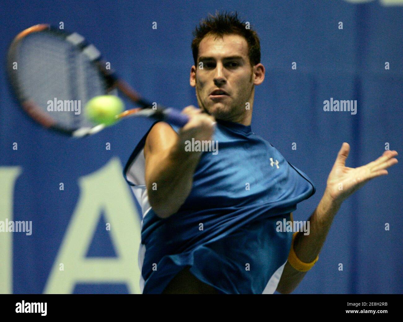 Robby Ginepri of the U.S. returns a shot to Kenneth Carlsen of Denmark during their first round match Thailand Open tennis tournament in Bangkok September 26, 2006.   REUTERS/Chaiwat Subprasom (THAILAND) Stock Photo