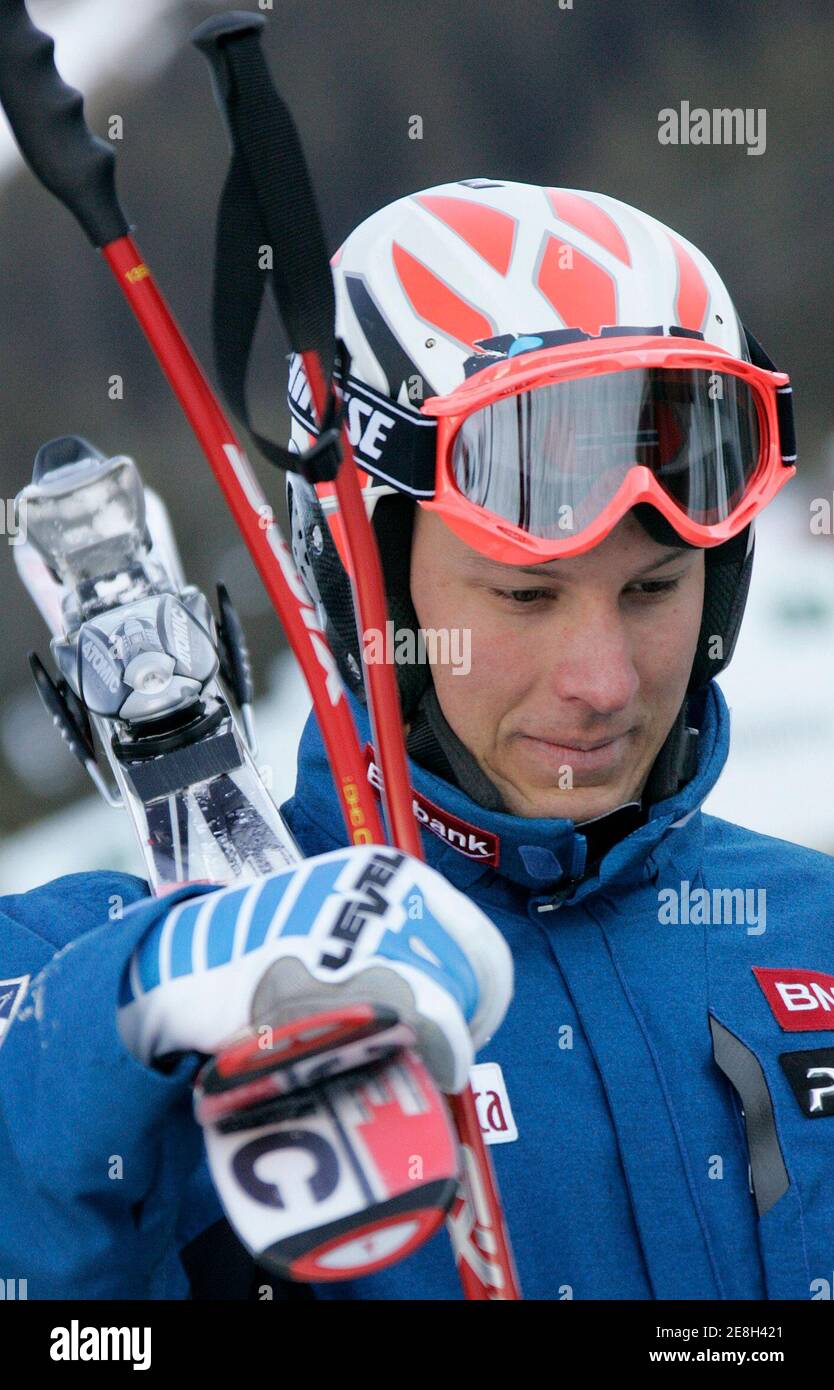 Aksel Lund Svindal of Norway makes his way to the chair lift before a training run for the men's downhill race at the Alpine Ski World Cup Finals in Lenzerheide March 13, 2007. REUTERS/Pascal Lauener (SWITZERLAND) Stock Photo