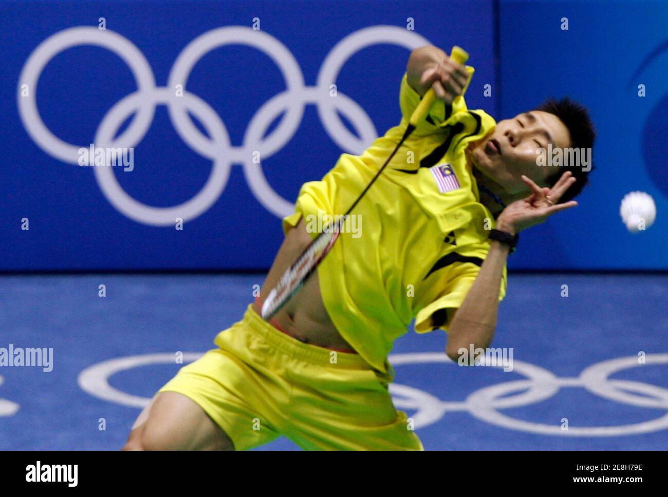 Lee Chong Wei of Malaysia returns a shot during his men's singles semifinal badminton match against Lee Hyunil of South Korea at the Beijing 2008 Olympic Games, August 15, 2008.     REUTERS/Beawiharta (CHINA) Stock Photo