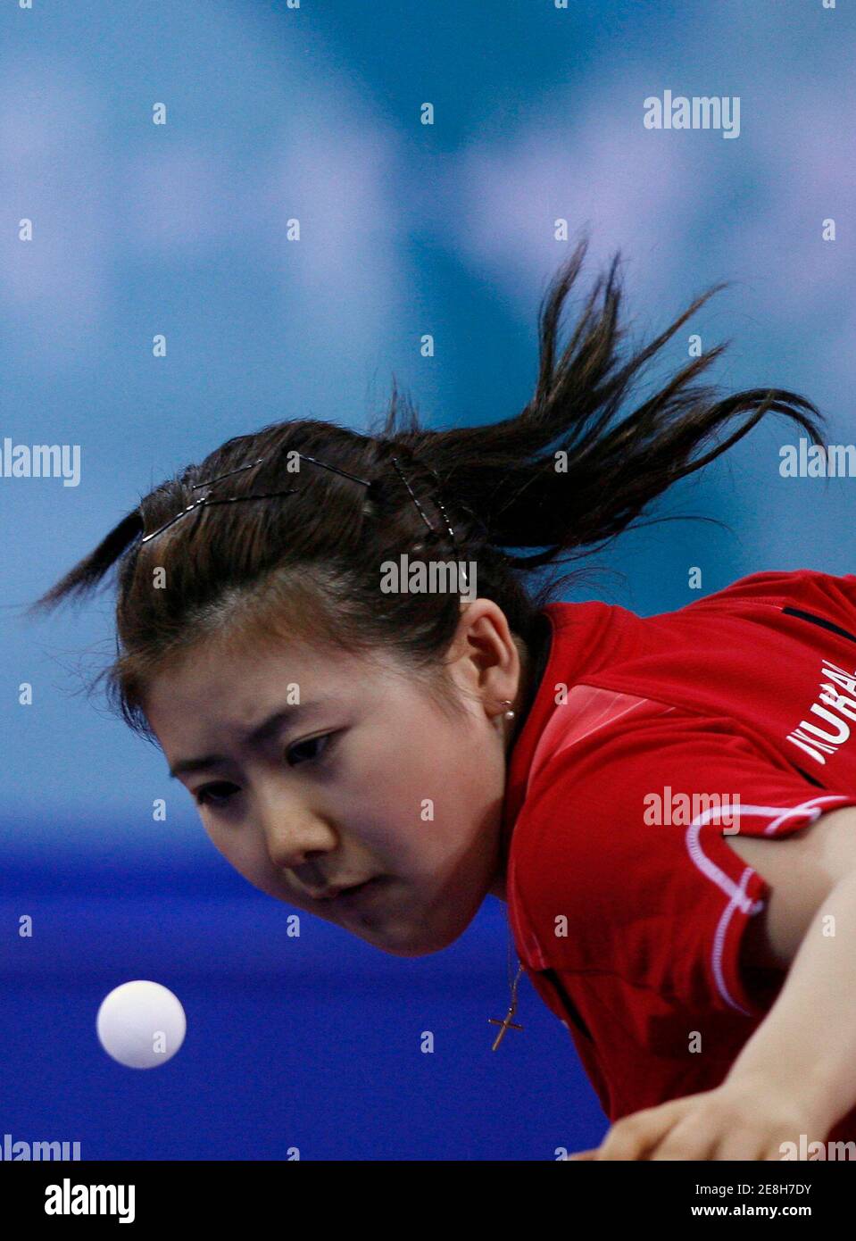 Ai Fukuhara of Japan plays a shot during her women's singles third round table tennis match against Melek Hu of Turkey at the Beijing 2008 Olympic Games August 20, 2008.   REUTERS/Beawiharta (CHINA) Stock Photo