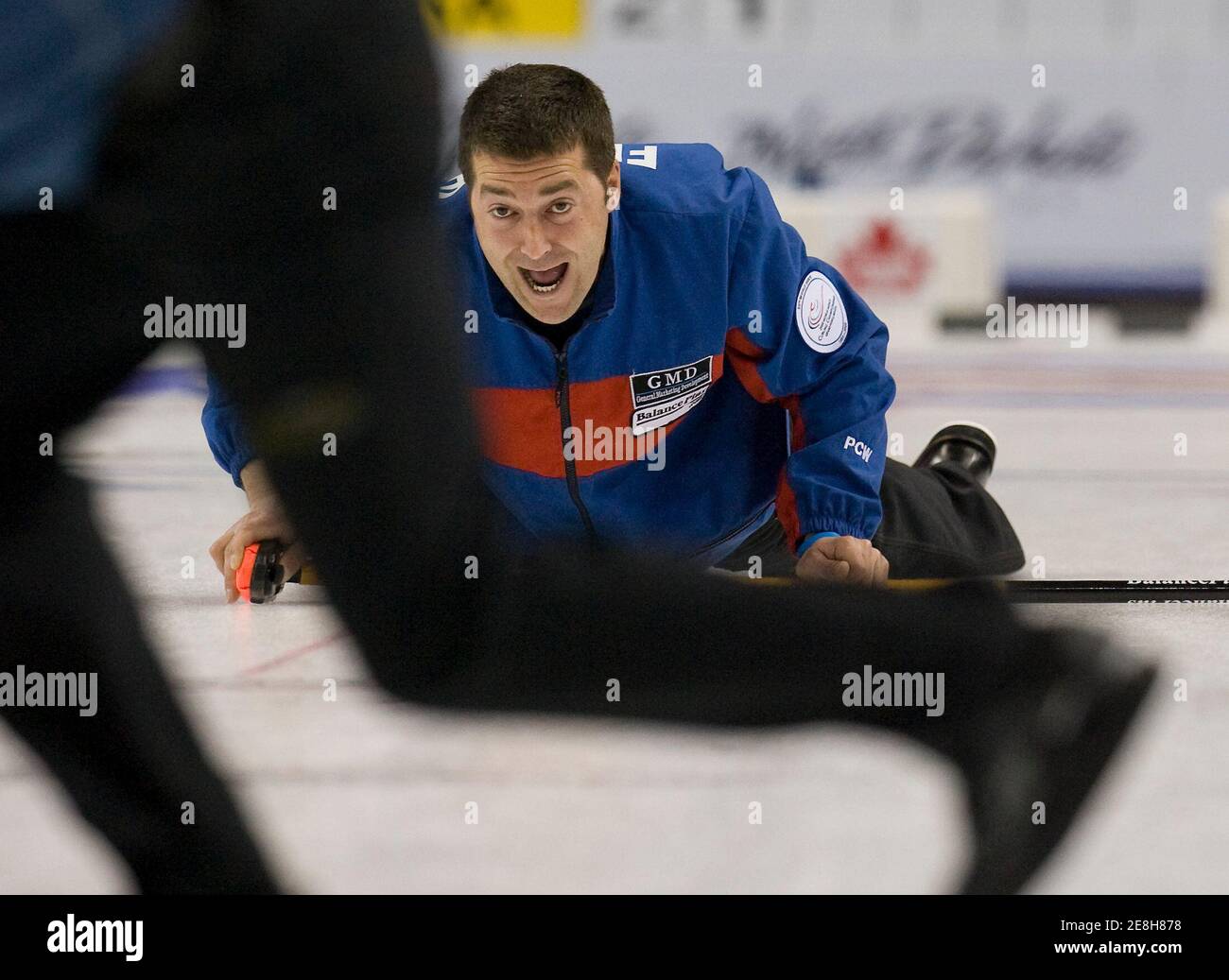 France's skip Thomas Dufour shouts to team mates during their game against Scotland at the World Men's Curling Championships in Grand Forks, North Dakota April 7, 2008.          REUTERS/Andy Clark     (UNITED STATES) Stock Photo