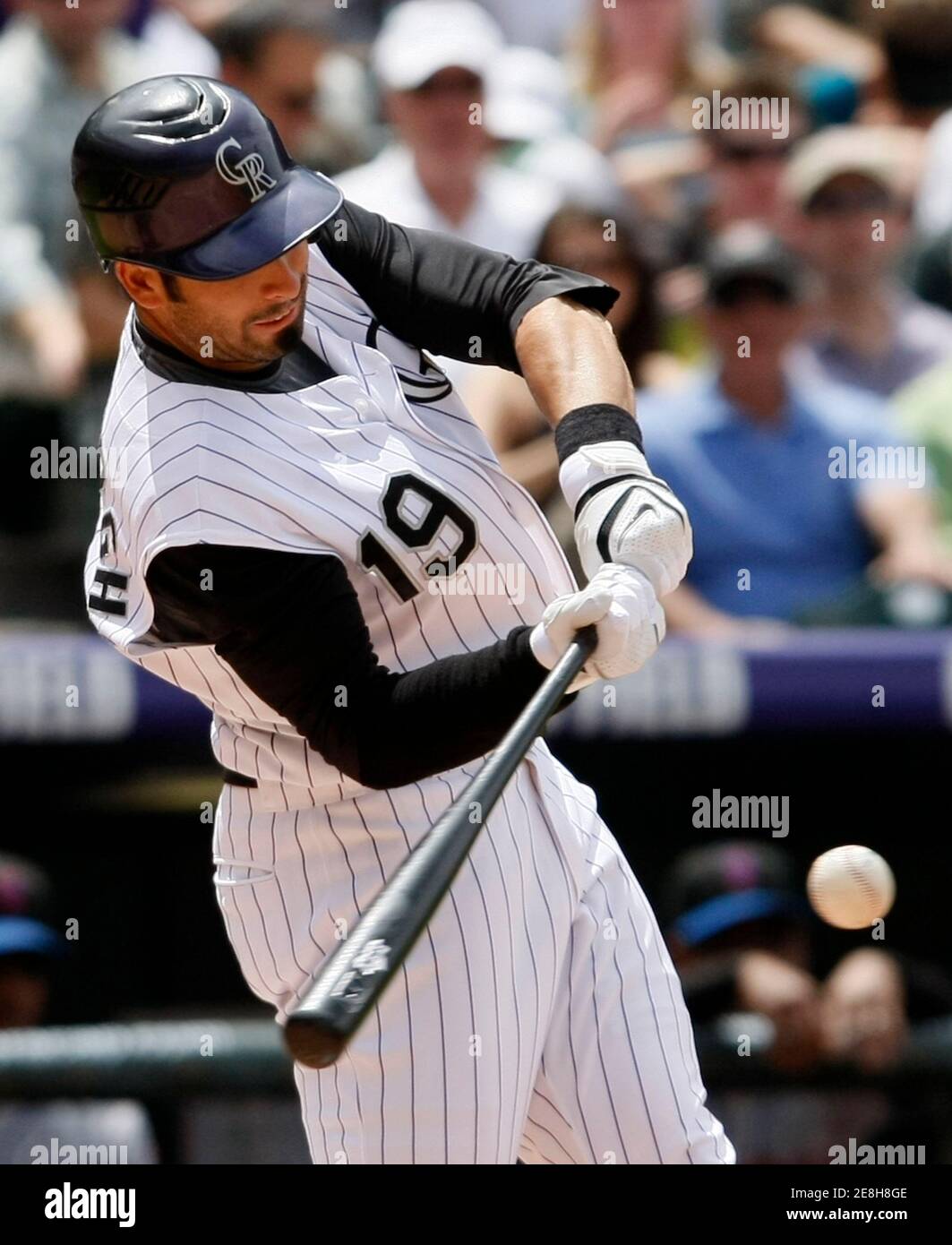 Colorado Rockies Ryan Spilborghs hits a single against the New York Mets in the fourth inning during their National League MLB baseball game in Denver, May 25, 2008.      REUTERS/Rick Wilking (UNITED STATES) Stock Photo
