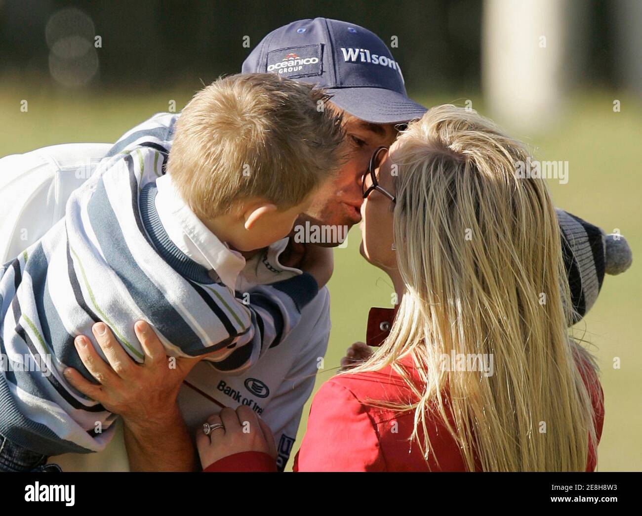Padraig Harrington of Ireland kisses his wife Caroline as they hold their  children Patrick (L) and Ciaran after winning the 2008 British Open Golf  Championship at Royal Birkdale, Southport, northern England July