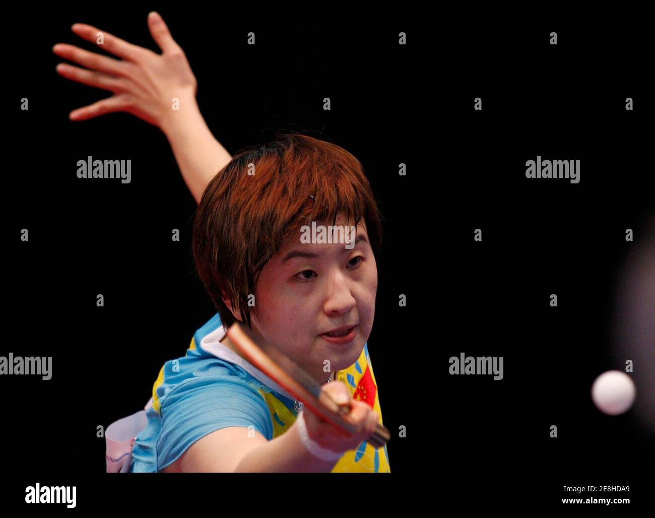 China's Yao Yan hits a shot during her table tennis women's singles semifinal match against South Korea's Seok Hajung at the East Asian Games in Hong Kong December 6, 2009. REUTERS/Tyrone Siu (CHINA SPORT TABLE TENNIS) Stock Photo