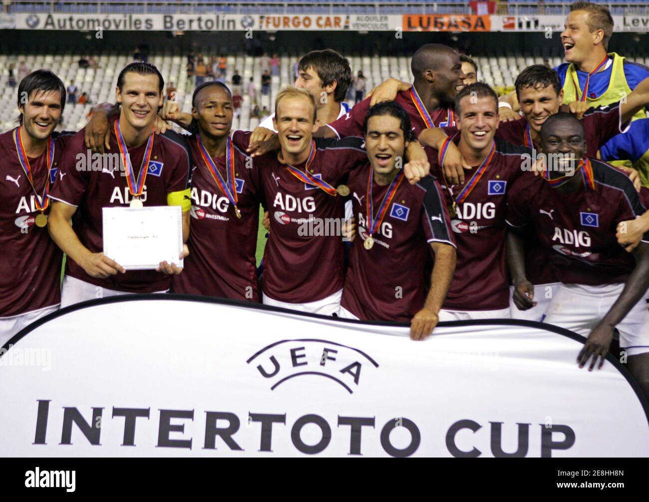 Hamburg's players celebrate after winning the UEFA Intertoto Cup final  against Valencia at Mestalla stadium in Valencia August 23, 2005. Hamburg  booked their place in this season's UEFA Cup after they held
