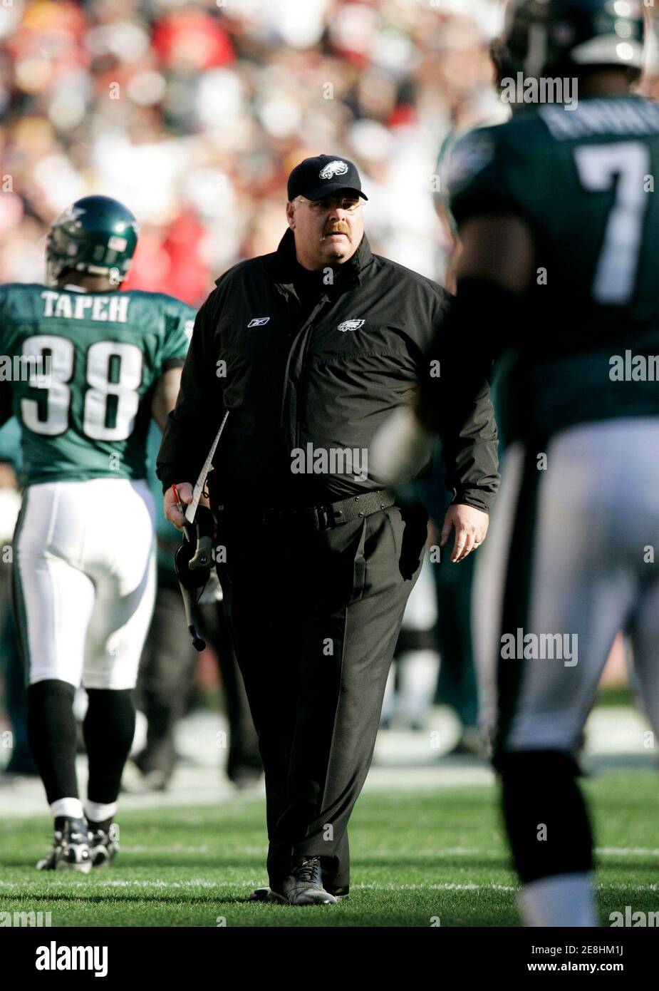 Philadelphia Eagles head coach Andy Reid watches his team come off the field in the first half against the Washington Redskins during their NFL football game in Landover, Maryland December 10, 2006.      REUTERS/Gary Cameron  (UNITED STATES) Stock Photo