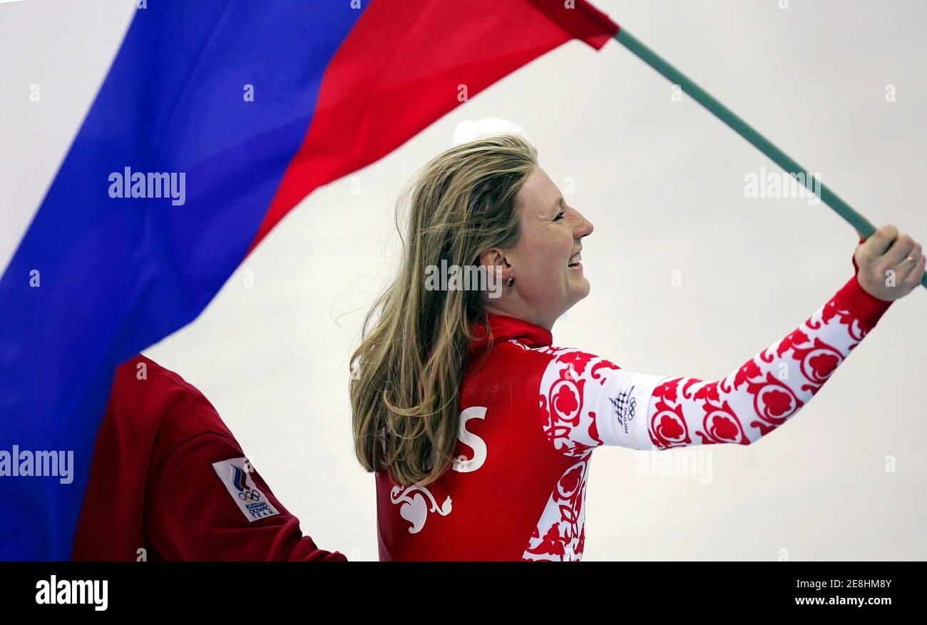 Svetlana Zhurova of Russia celebrates after winning gold in the women's speed skating 500 metres race at the Torino 2006 Winter Olympic Games at Oval Lingotto in Turin, Italy February 14, 2006. Stock Photo