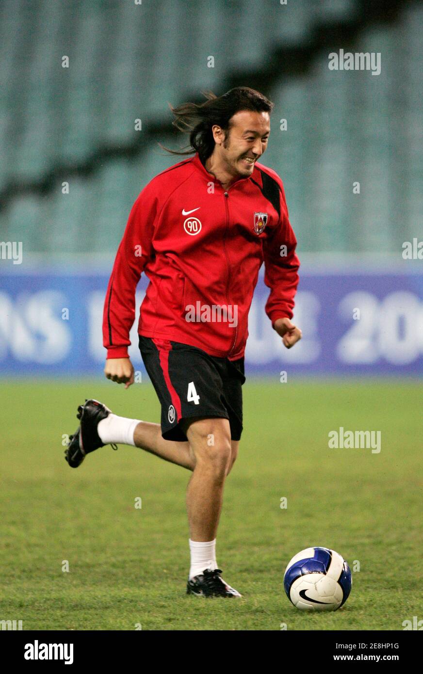Tulio of the Urawa Red Diamonds from Japan warms up before training at the Sydney Football Stadium March 20, 2007. The Urawa Red Diamonds will play against Sydney FC in the Asian Football Confederation (AFC) Champions League soccer match on March 21. REUTERS/Will Burgess   (AUSTRALIA) Stock Photo