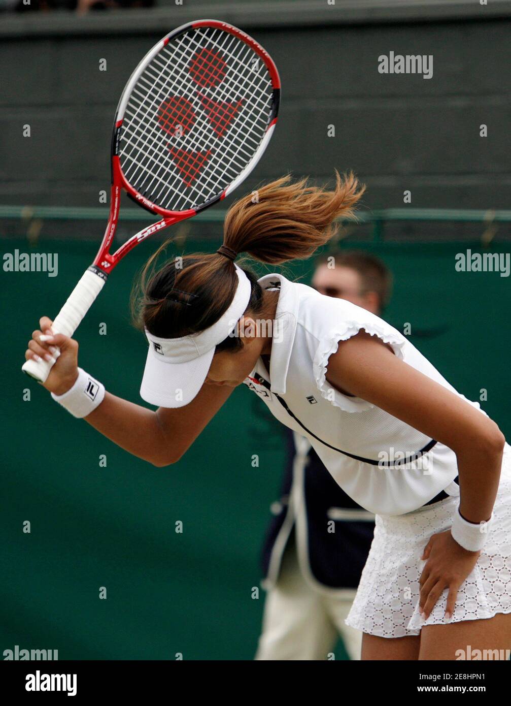Japan's Akiko Morigami reacts during her singles match against Venus Williams of the U.S. at the Wimbledon tennis championships in London, July 2, 2007.     REUTERS/Alessia Pierdomenico (BRITAIN) Stock Photo