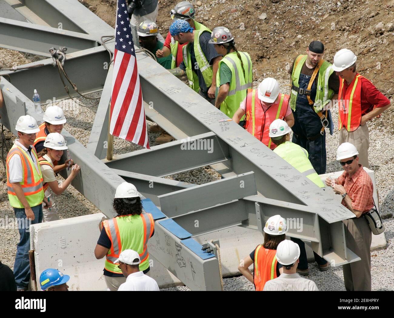Construction and various team personnel sign a steel girder inside the new Washington Nationals baseball stadium, Nationals Park, on July 11, 2007. The stadium will open next season in April 2008.     REUTERS/Gary Cameron   (UNITED STATES) REUTERS Stock Photo