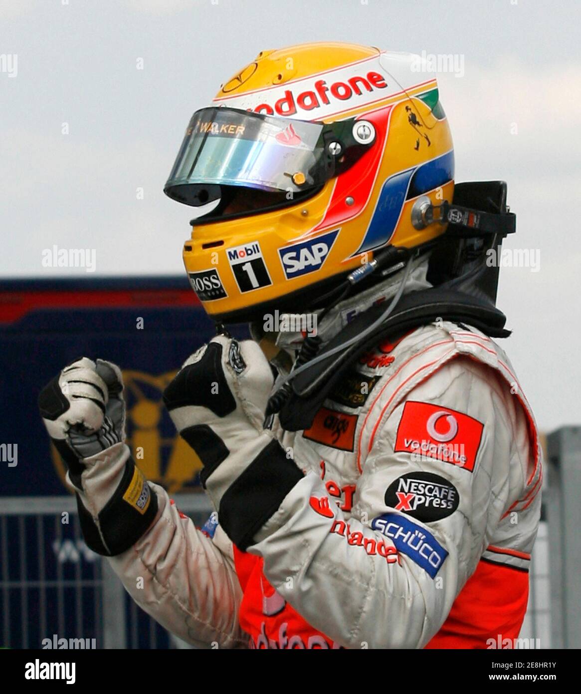 McLaren Formula One driver Lewis Hamilton of Britain celebrates after winning the Hungarian F1 Grand Prix at the Hungaroring near Budapest August 5, 2007.   REUTERS/Ivan Milutinovic (HUNGARY) Stock Photo
