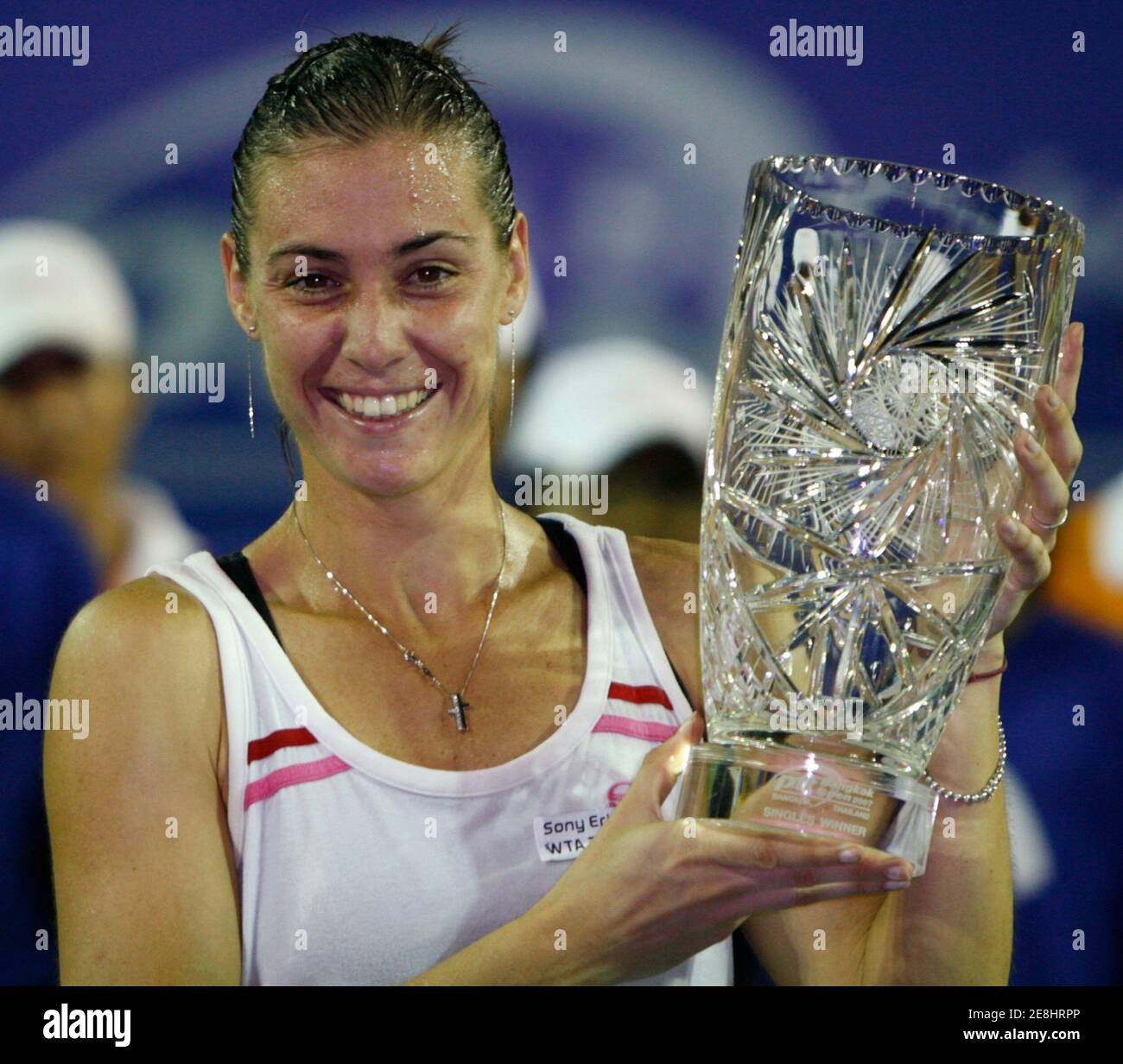 Flavia Pennetta of Italy holds the trophy after defeating Yung-Jan Chan of Taiwan during their women's final tennis match at the PTT Bangkok Open in Bangkok October 14, 2007.  Pennetta won 6-1 6-3. REUTERS/Chaiwat Subprasom (THAILAND) Stock Photo