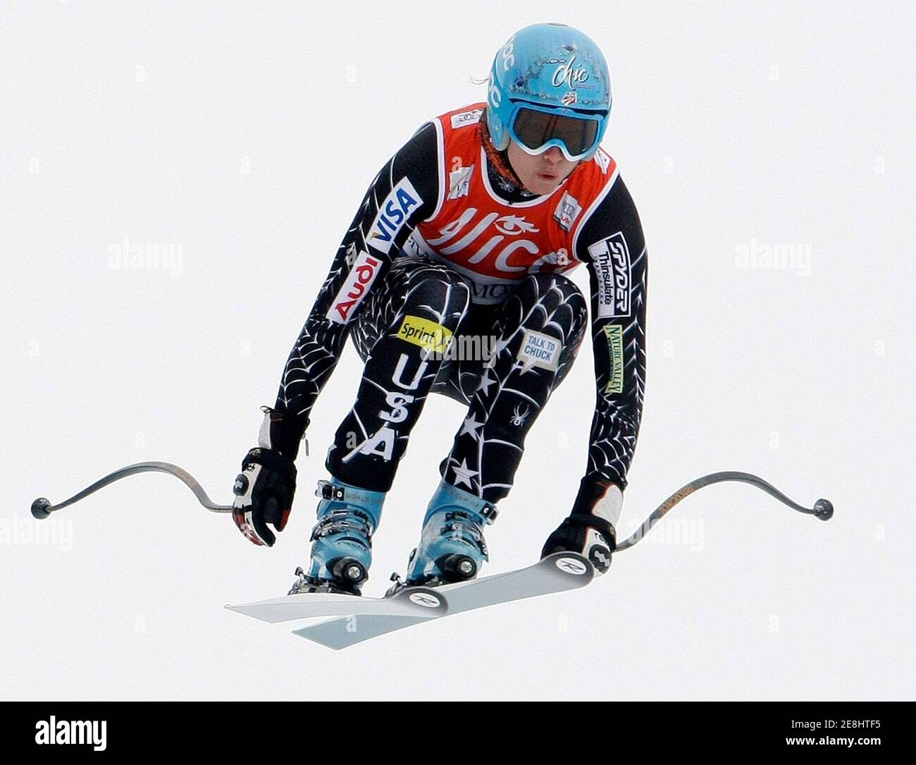 Julia Mancuso of the U.S. takes a jump during the women's Alpine Skiing World Cup downhill race in the Swiss mountain resort of Crans-Montana March 8, 2008. Lindsey Vonn of the U.S. won the race ahead of Austria's Renate Goetschl and Nadia Fanchini of Italy. Mancuso finished in fourth place. REUTERS/Pascal Lauener (Switzerland) Stock Photo