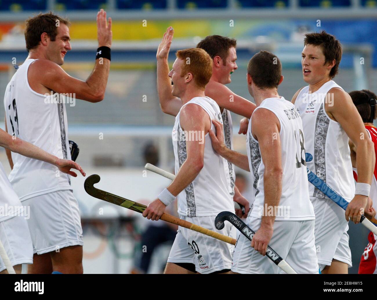 Benjamin Collier of New Zealand and team mates celebrate a goal during their men's pool MA hockey match against Belgium at the Beijing 2008 Olympic Games August 15, 2008.     REUTERS/Oleg Popov (CHINA) Stock Photo