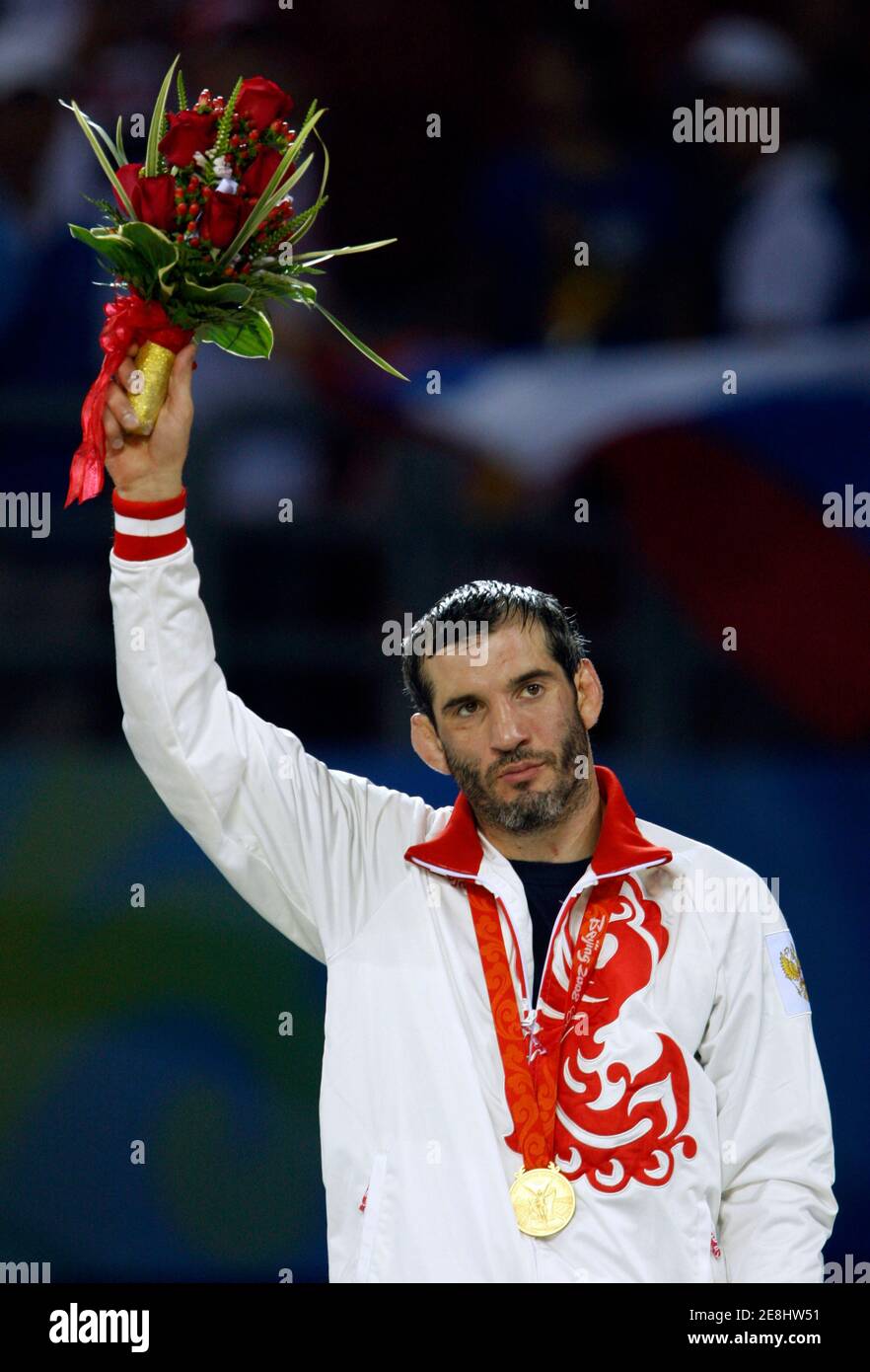 Buvaysa Saytiev of Russia poses with his gold medal in the 74kg men's freestyle wrestling at the Beijing 2008 Olympic Games August 20, 2008.     REUTERS/Oleg Popov (CHINA) Stock Photo