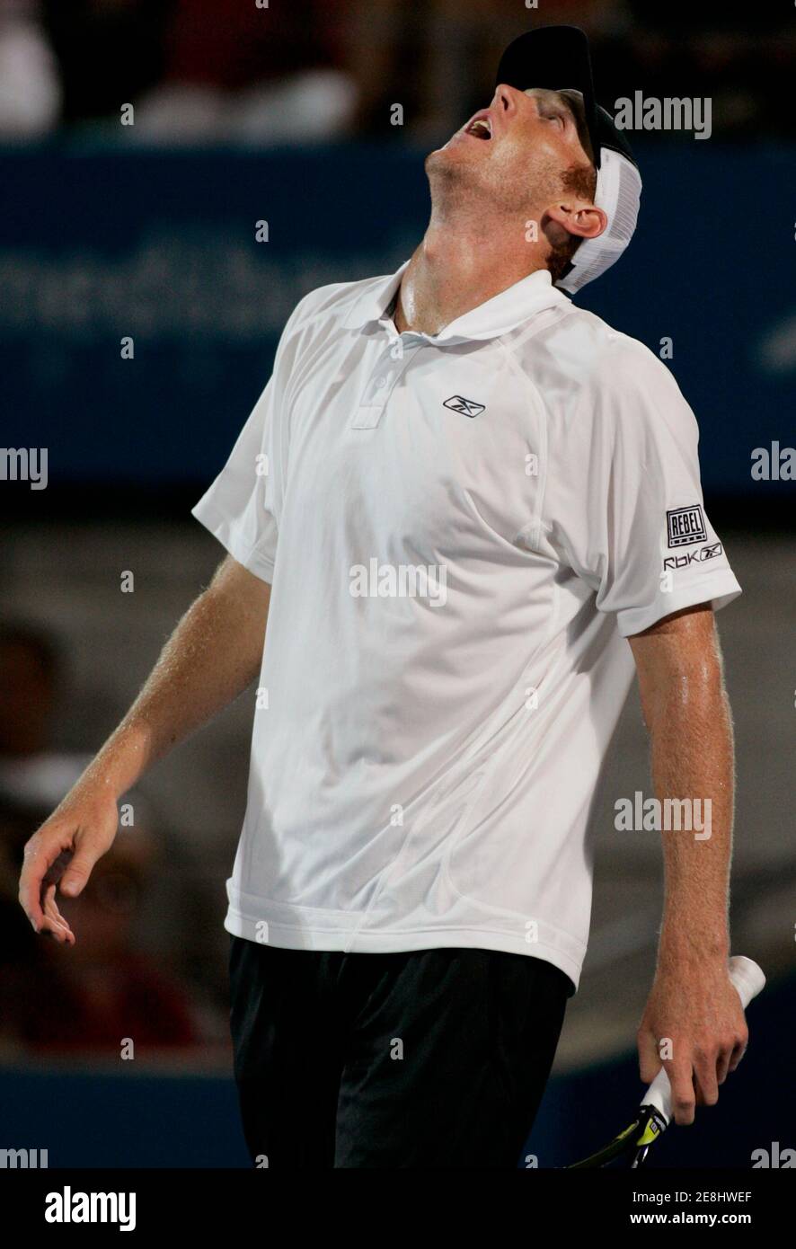 Australia's Chris Guccione reacts to a missed shot during his loss to Russia's Dmitry Tursunov in the men's singles final at the Sydney International tennis tournament January 12, 2008. REUTERS/Will Burgess    (AUSTRALIA) Stock Photo