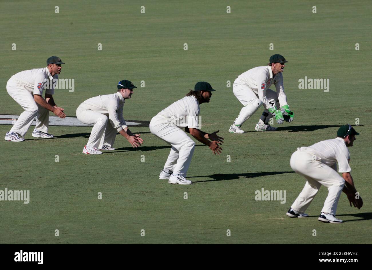 Australia's (L-R) Matthew Hayden, Michael Clarke, Andrew Symonds, Adam Gilchrist and Michael Hussey wait in the slips during the fourth day of their fourth and final test cricket match against India at the Adelaide Oval January 27, 2008. REUTERS/Will Burgess   (AUSTRALIA) Stock Photo
