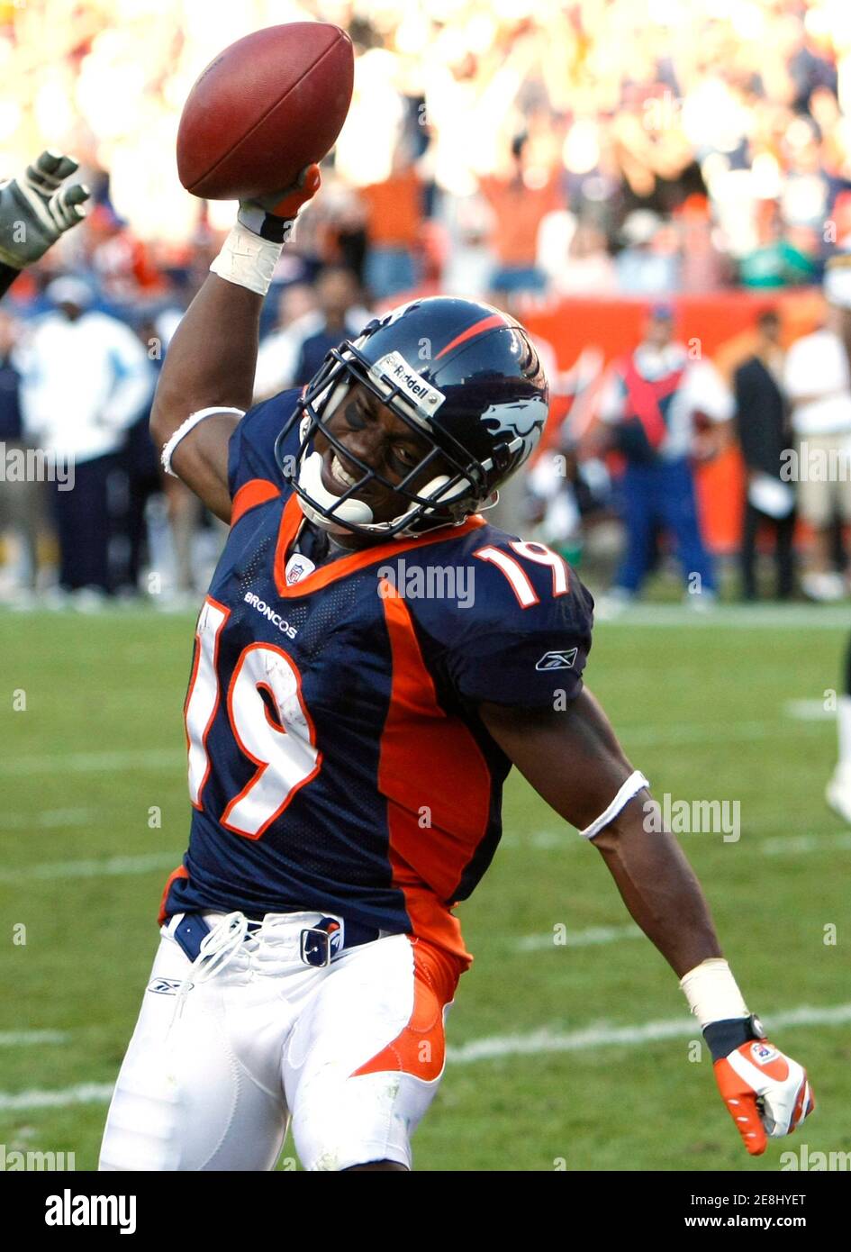 Denver Broncos wide receiver Eddie Royal celebrates catching a pass in the endzone for a touchdown against the San Diego Chargers late in the fourth quarter during their NFL football game in Denver September 14, 2008. Royal went on to catch a two-point conversion on the next play to win the game. REUTERS/Rick Wilking (UNITED STATES) Stock Photo