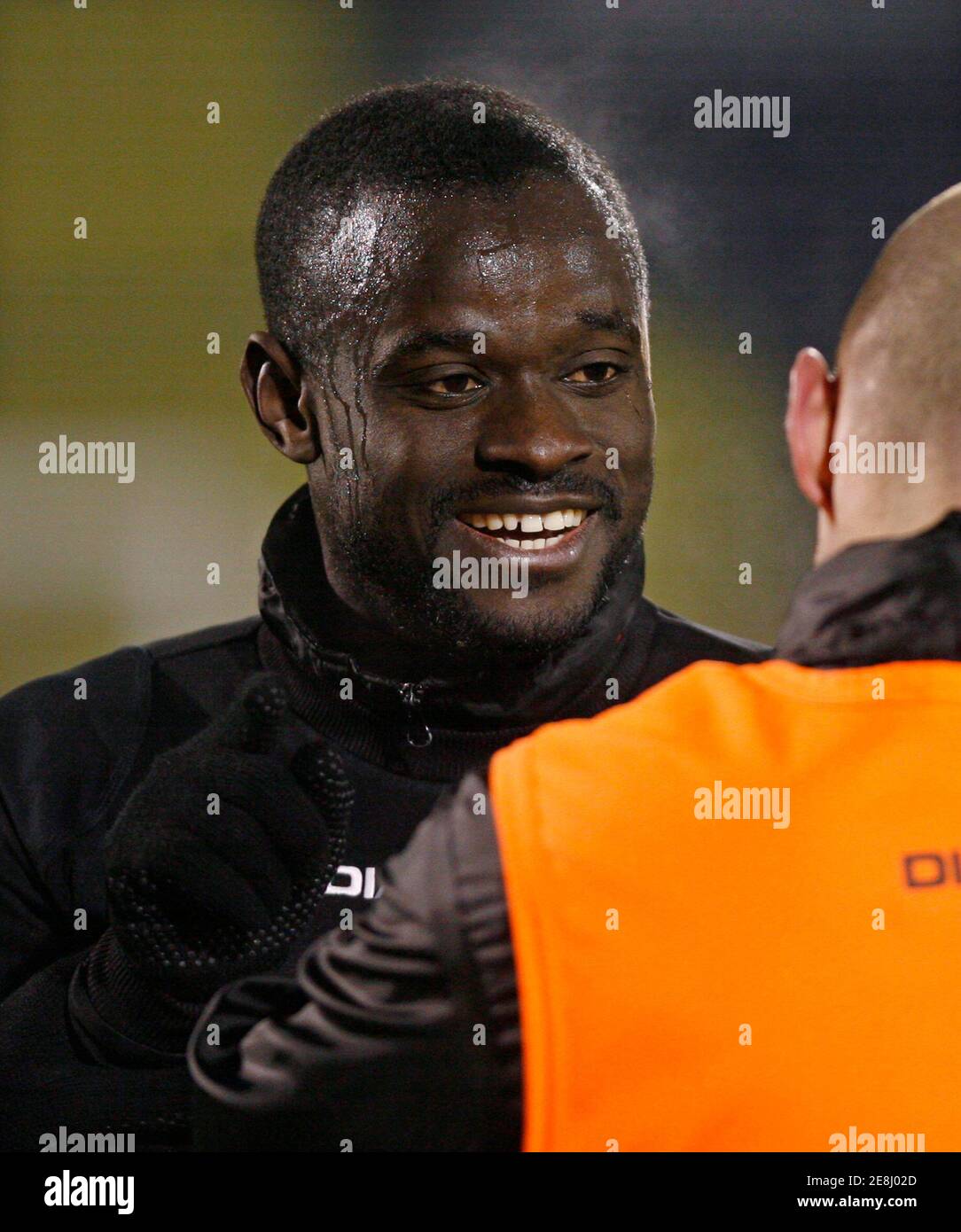 Standard Liege's Mohamed Sarr smiles during a training session in Belgrade November 26, 2008. Standard Liege will face Partizan Belgrade in their UEFA Cup soccer match on Thursday.  REUTERS/Ivan Milutinovic  (REUTERS) Stock Photo
