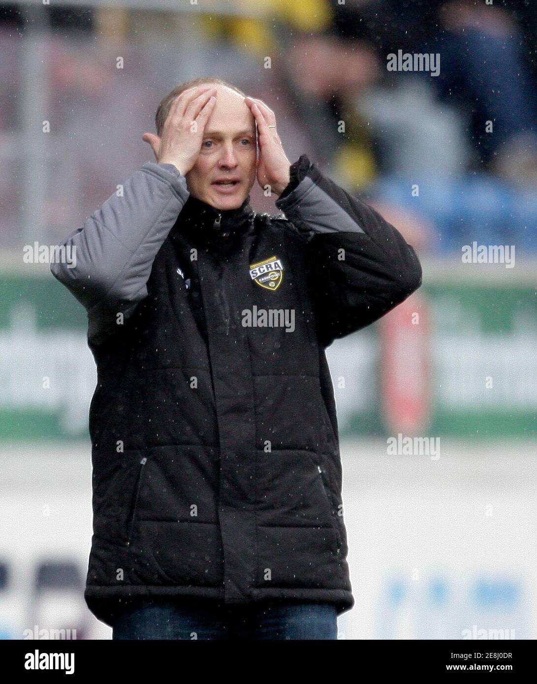 Altach's head coach Georg Zellhofer reacts during their Austrian league soccer match against Salzburg in Altach March 15, 2009. REUTERS/Miro Kuzmanovic (AUSTRIA SPORT SOCCER) Stock Photo
