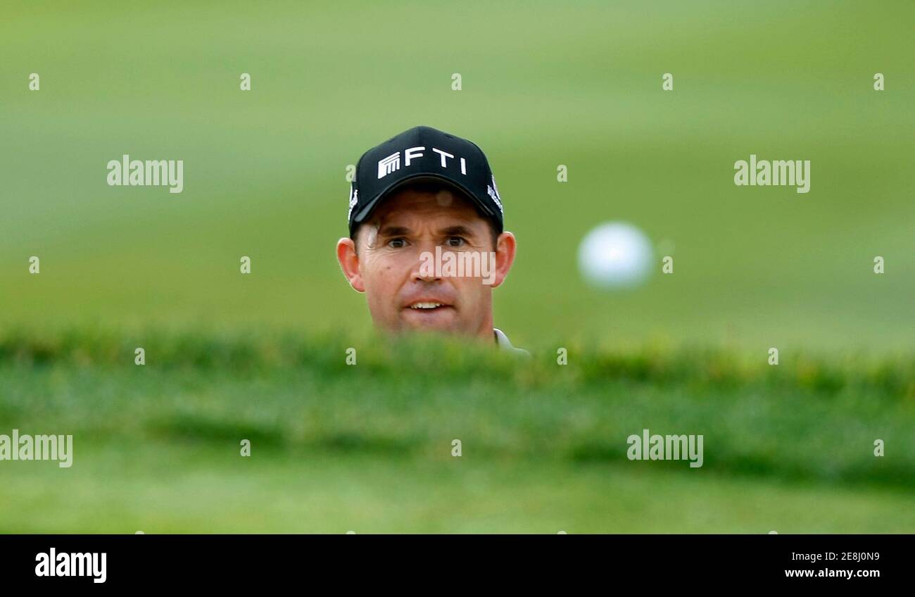 Irish golfer Padraig Harrington watches his bunker shot land on the 17th green of the south course at Torrey Pines during second round play at the  Buick Invitation golf tournament in San Diego, California February 6, 2009. REUTERS/Mike Blake  (UNITED STATES) Stock Photo