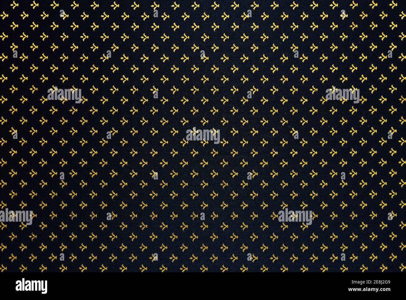 Elegant and rich abstract textile background. Gold monograms on the dark  background Stock Photo - Alamy