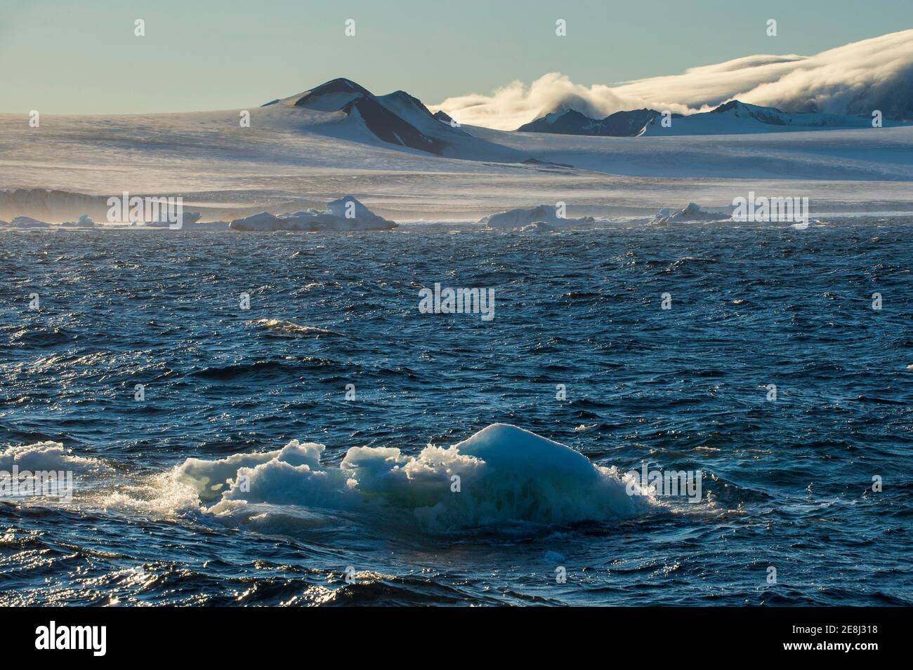 Little icebergs loating before the huge glaciers on Tabarin Peninsula, Antarctica Stock Photo