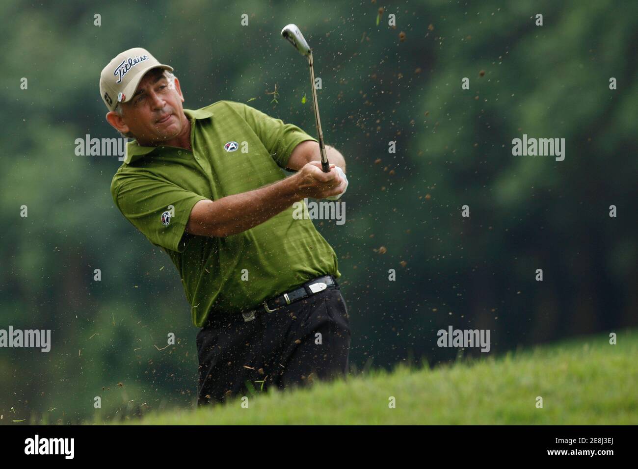 Hendrik Buhrmann of South Africa hits a shot on the sixth fairway during the second day of the Hong Kong Open golf tournament November 13,2009     REUTERS/Tyrone Siu    (CHINA POLITICS SPORT GOLF) Stock Photo