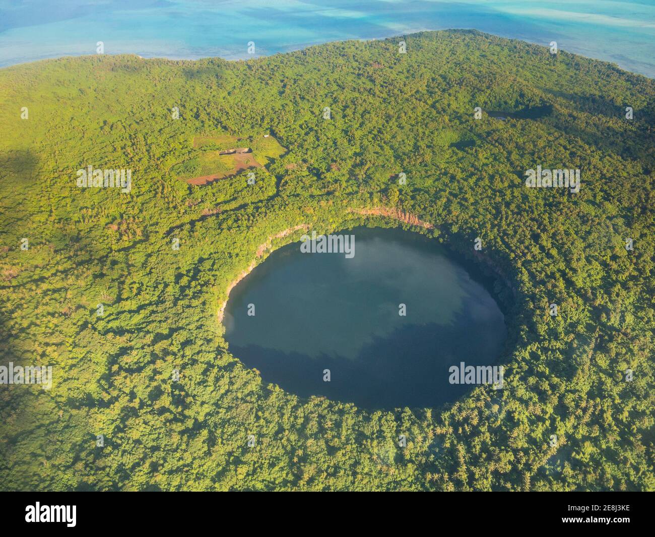 Aerial of Lalolalo lake volcanic crater lake, center of Wallis, Wallis and Futuna Stock Photo