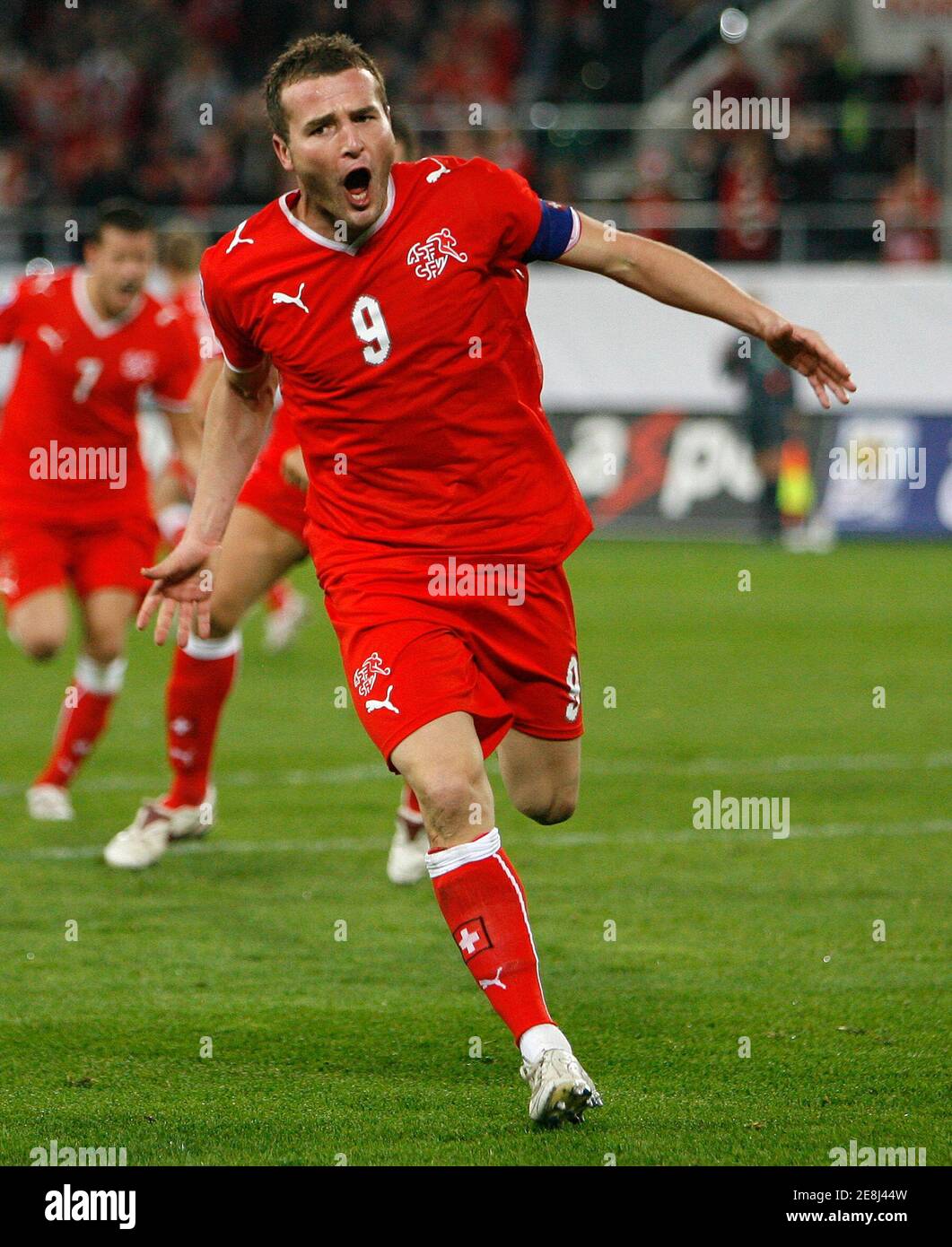 Switzerland's Alexander Frei celebrates after scoring during their 2010 World Cup qualifying soccer match against Latvia in St. Gallen October 11, 2008. Frei is his country's record scorer with 40 goals in 73 games and, with only two of the other probable squad members having reached double figures, his country's hopes of goals will be placed largely on his back. Picture taken October 11, 2008. To match Feature SOCCER-WORLD/SWITZERLAND-FREI     REUTERS/Miro Kuzmanovic (SWITZERLAND - Tags: SPORT SOCCER WORLD CUP) Stock Photo