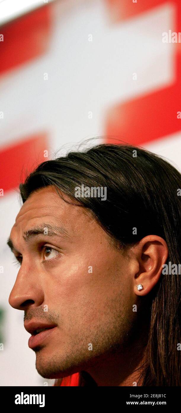 Swiss forward Hakan Yakin addresses a news conference at St. Jakob Park stadium in Basel, Switzerland, May 27, 2006. Yakin has been recalled from his holidays as a possible World Cup replacement for injured striker Johan Vonlanthen who partially tore a hamstring during a training with Switzerland's national soccer team on Monday. WORLD CUP 2006 PREVIEW REUTERS/Pascal Lauener Stock Photo