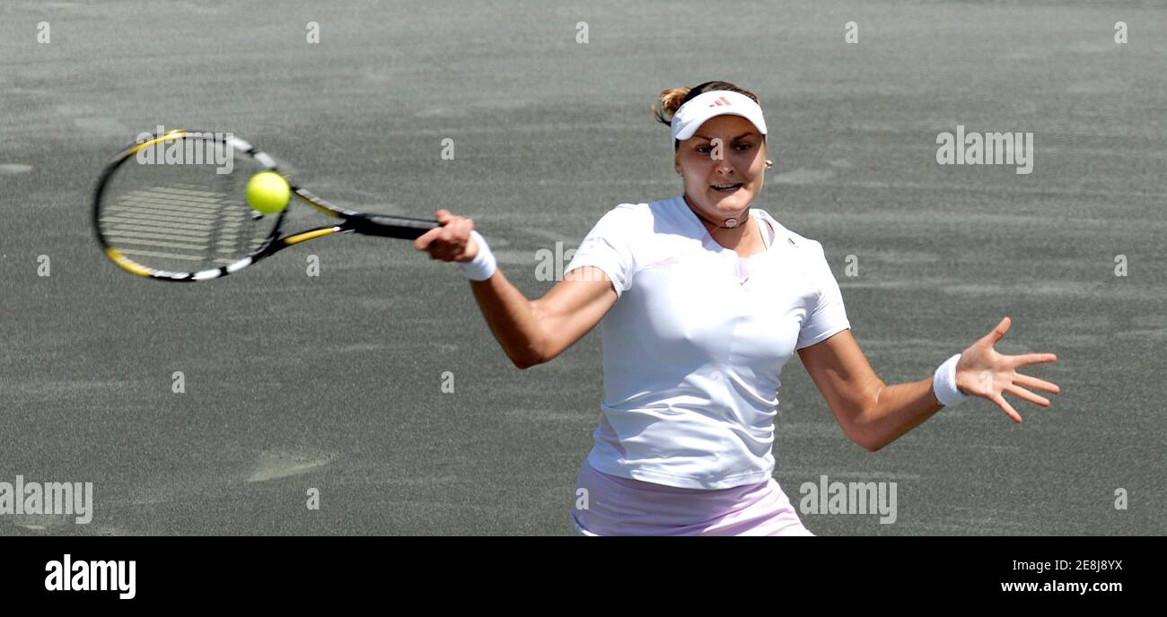 Nadia Petrova of Russia returns a serve to Patty Schnyder of Switzerland  during their championship match of the 2006 Family Circle Cup tennis  tournament in Charleston, South Carolina April 16, 2006. Patrova