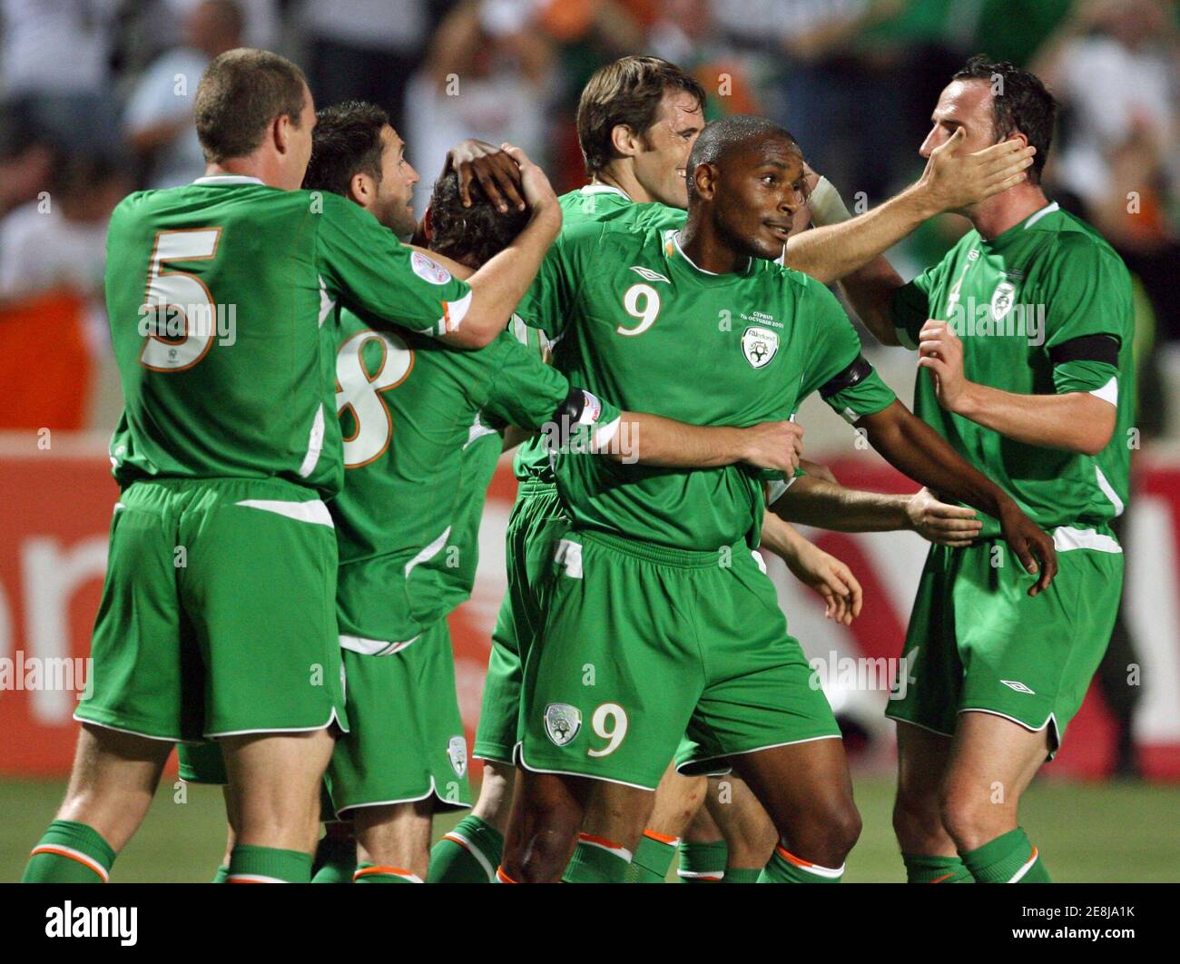 Ireland players celebrate their first goal against Cyprus during their Group D Euro 2008 qualifying soccer match in Nicosia October 7, 2006.   REUTERS/Oleg Popov     (CYPRUS) Stock Photo