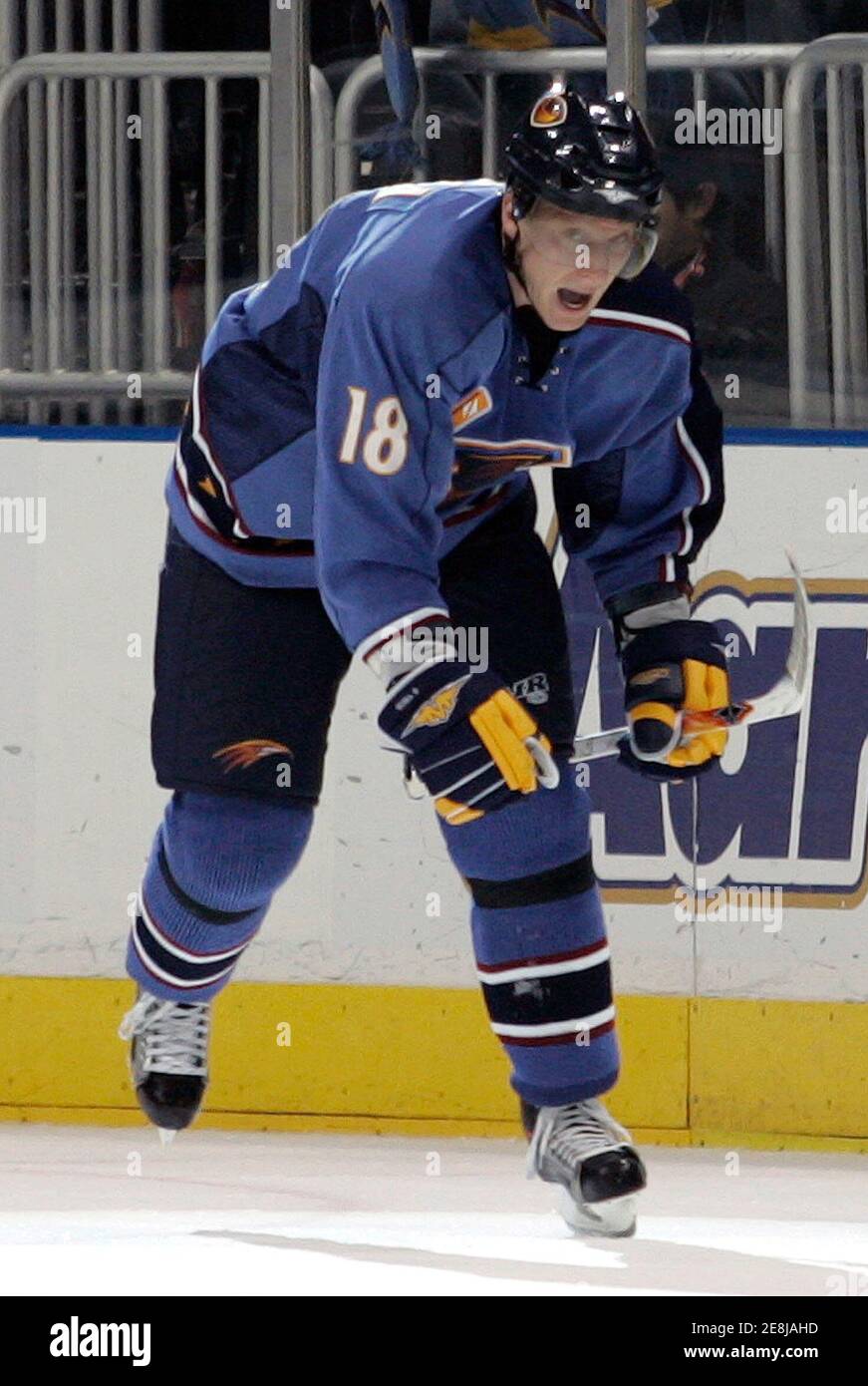 Atlanta Thrashers right wing Marian Hossa (18) reacts after scoring a goal  against the Pittsburgh Penguins during a shootout at their NHL hockey game  in Atlanta, Georgia December 21, 2006. REUTERS/Tami Chappell (
