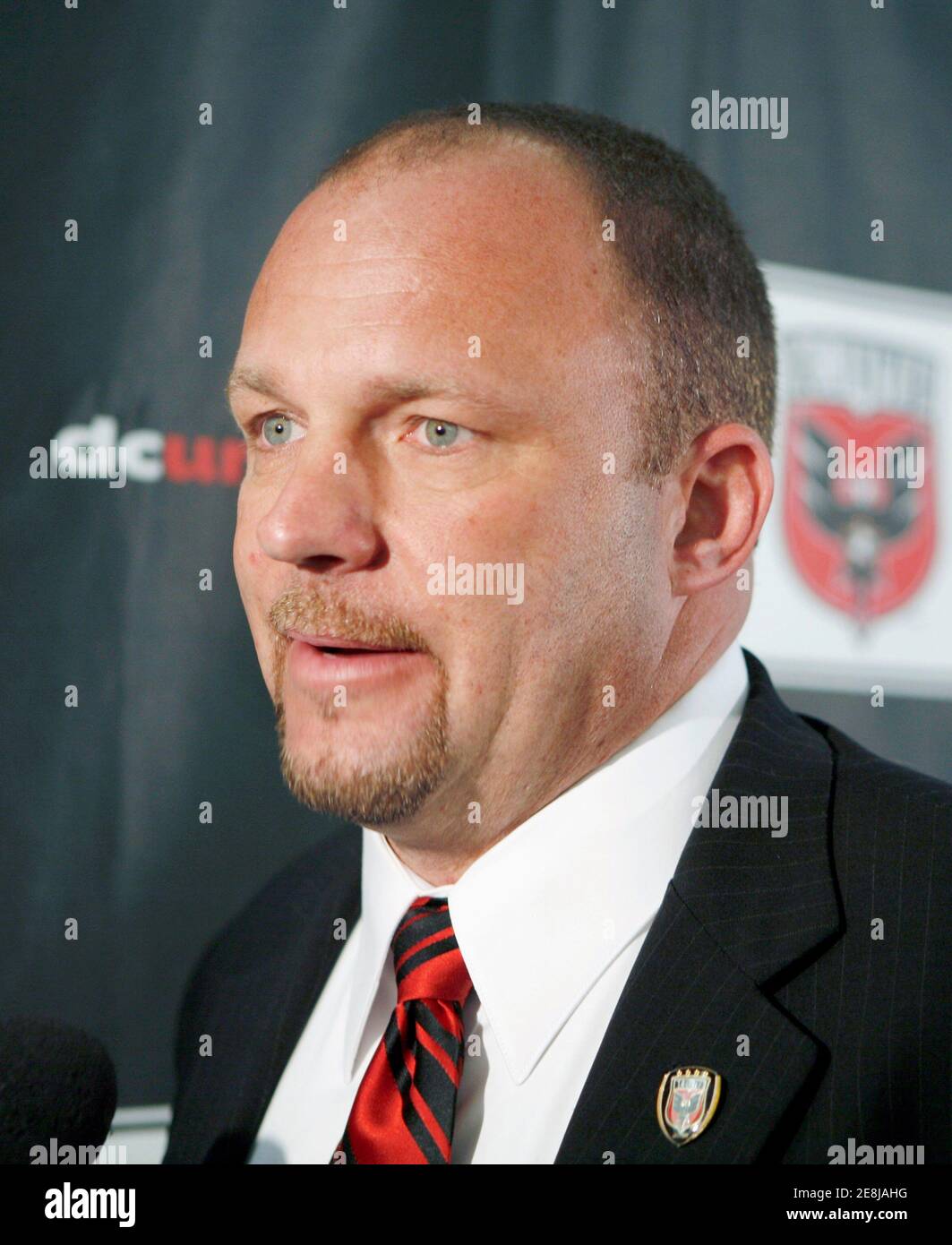 Tom Soehn speaks after he was named the new coach at D.C. United in Washington December 21, 2006, replacing Peter Nowak, who left the Major League Soccer club to become an assistant under U.S. national team interim coach Bob Bradley. REUTERS/Steve Ginsburg (UNITED STATES) Stock Photo