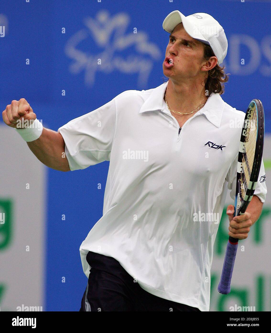 Russia's Igor Andreev urges himself on during his semi-final match against Andreas Seppi of Italy at the Sydney International tennis tournament January 13, 2006. Andreev beat Seppi 6-2 2-6 6-2. REUTERS/Will Burgess Stock Photo