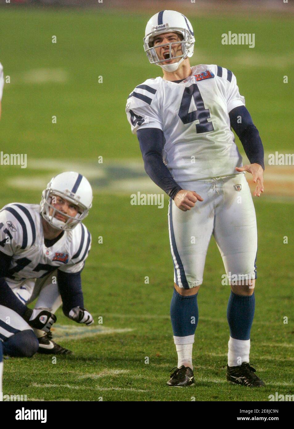 Indianapolis Colts Adam Vinatieri reacts to missing a field goal against the Chicago Bears in the second quarter of the NFL's Super Bowl XLI football game in Miami, Florida, February 4, 2007. Holder Hunter Smith watches at left. REUTERS/Gary Cameron (UNITED STATES) Stock Photo