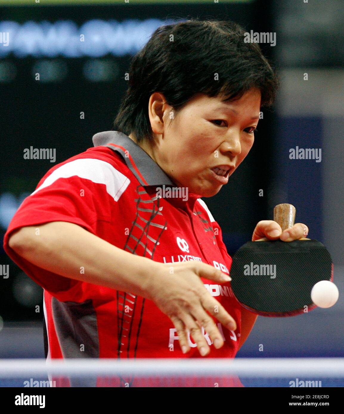 Luxembourg's Xia Lian Ni hits a return to Belarus' Viktoria Pavlovich during their women's singles semifinal match at the European Table Tennis Championships in Belgrade March 31, 2007. REUTERS/Ivan Milutinovic (SERBIA) Stock Photo