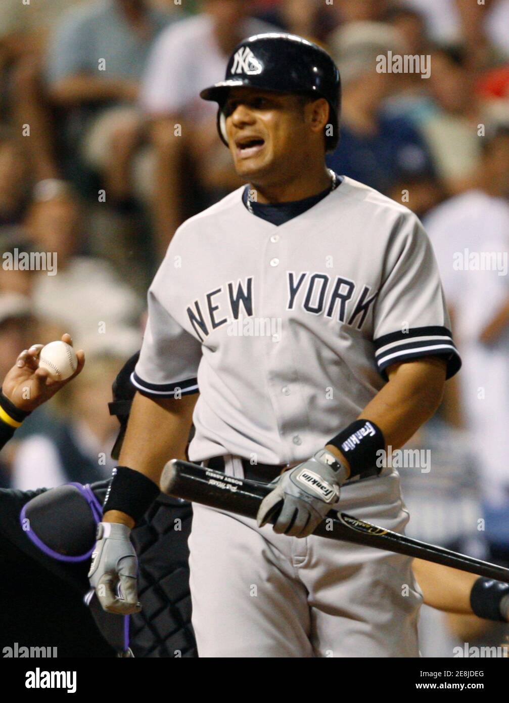 New York Yankees batter Bobby Abreu reacts after missing a pitch against the Colorado Rockies in the top of the ninth inning in their MLB interleague baseball game in Denver, Colorado June 20, 2007. REUTERS/Rick Wilking (UNITED STATES) Stock Photo