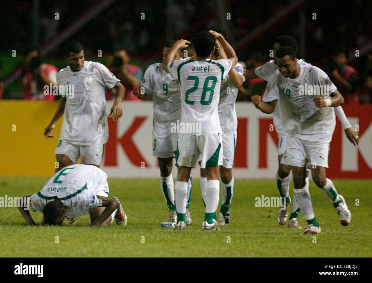Saudi Arabia's players celebrate after a goal against Indonesia during their 2007 AFC Asian Cup Group D soccer match in Jakarta July 14, 2007. REUTERS/Beawiharta (INDONESIA) Stock Photo