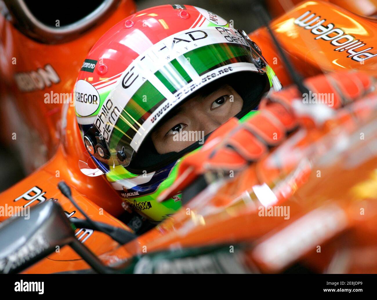 Spyker Formula One driver Sakon Yamamoto of Japan sits in his car in the pit during the first free practice for the Hungarian F1 Grand Prix in Budapest August 3, 2007. The Hungarian F1 Grand Prix will take place on Sunday, August 5.  REUTERS/Ivan Milutinovic (HUNGARY) Stock Photo